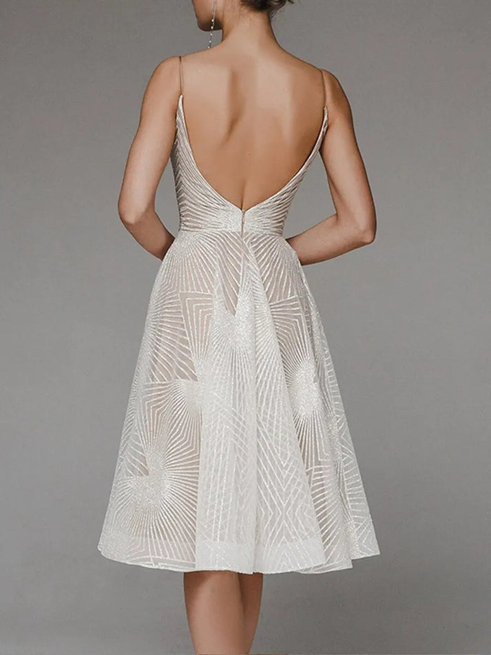 Sybil - Elegant dress with an open back